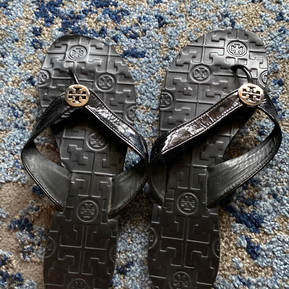 Tory Burch black flip flops-like new